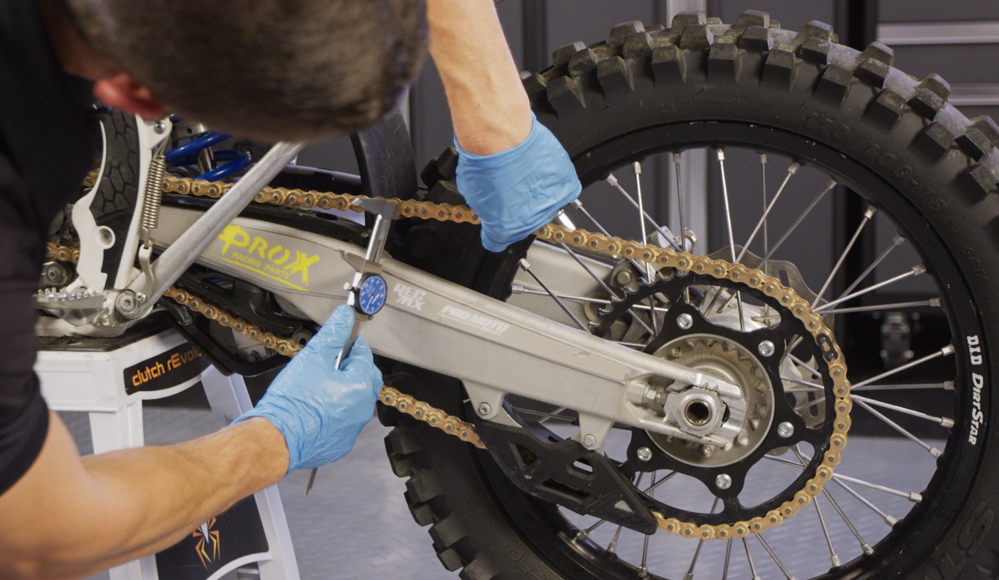 How to tighten drive chain on atv